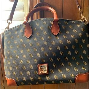 Brown Dooney & Bourke crossbody red inside.